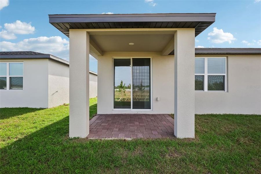 Exterior details and patio area of a home in Hamilton Bluff - Signature Series, Lake Hamilton (Image 22).