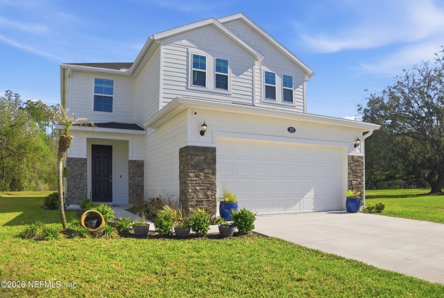 Front exterior of a new home in , St. Augustine, FL, highlighting curb appeal (Image 20).