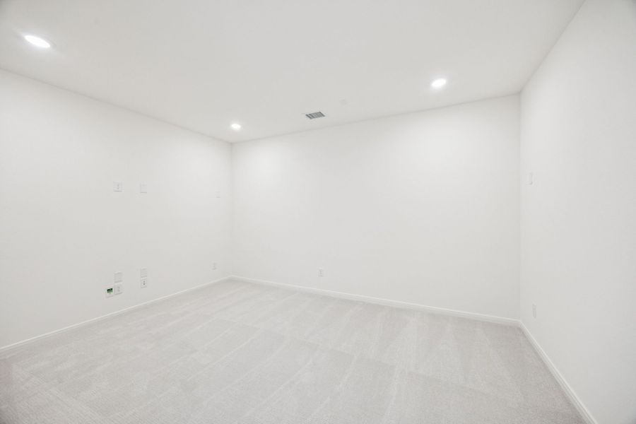 Representative unfurnished interior of a home built from the Percy by Normandy Homes in Rainwater Crossing, Celina (Image 13).