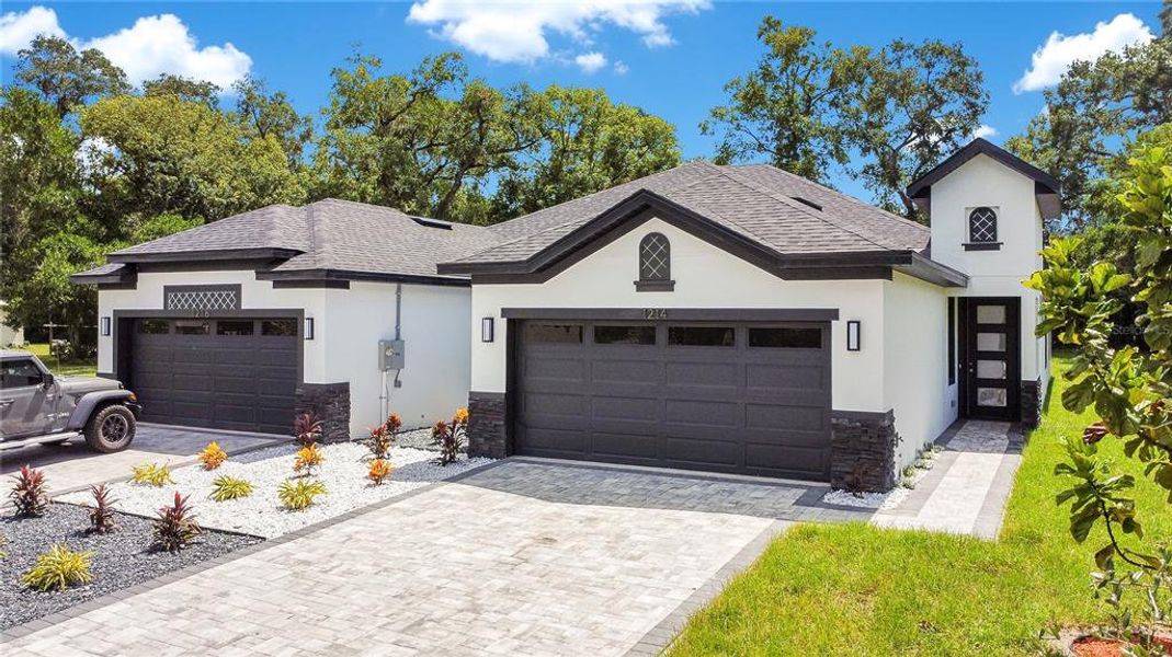 Front exterior of a new home in , Apopka, FL, highlighting curb appeal (Image 39).