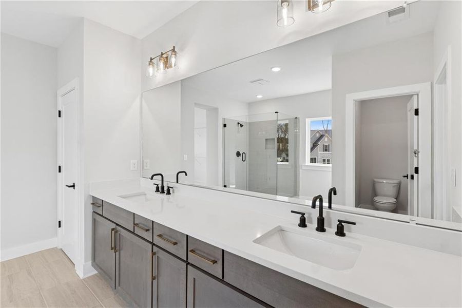 Furnished interior view inside a new home in Settingdown Farms, Cumming (Image 6).
