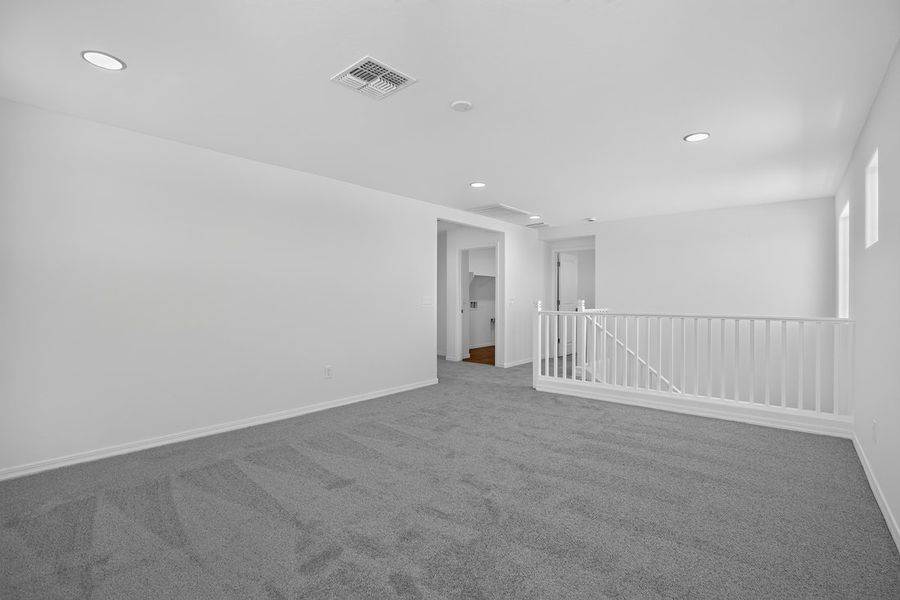 Spacious, unfurnished interior of a new home in Artisan at Asante, Surprise (Image 22).