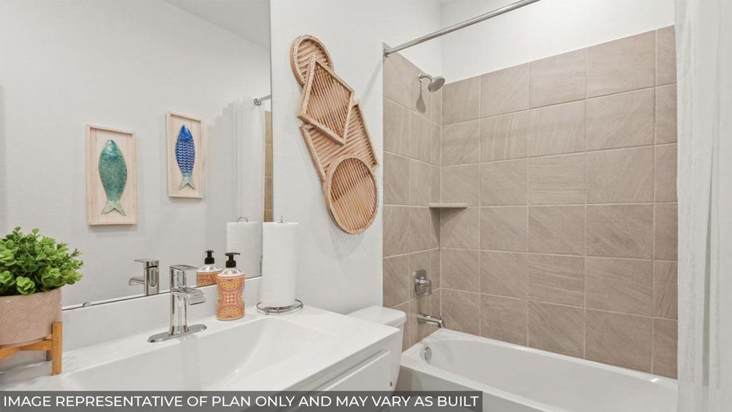 Furnished interior view inside a new home in Sunterra, Katy (Image 33).