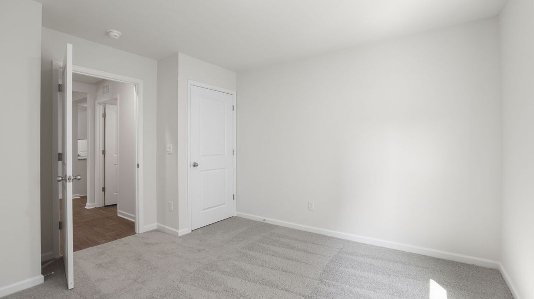 Spacious, unfurnished interior of a new home in Wildbrook Village, Waynesville (Image 20). Spacious, unfurnished interior of a new home in Wildbrook Village, Waynesville (Image 20).