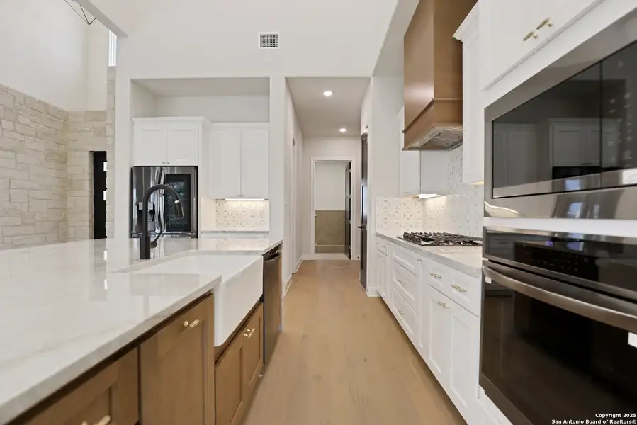 Furnished interior view inside a new home in , Bulverde (Image 3).