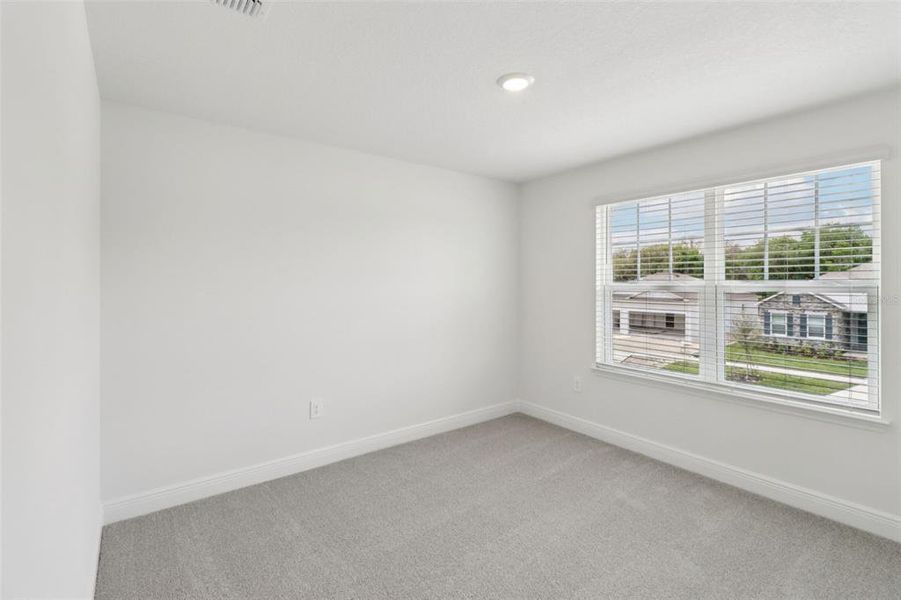 Spacious, unfurnished interior of a new home in The Reserve at Hammock Oaks - Classic Series, Lady Lake (Image 35). Spacious, unfurnished interior of a new home in The Reserve at Hammock Oaks - Classic Series, Lady Lake (Image 35).