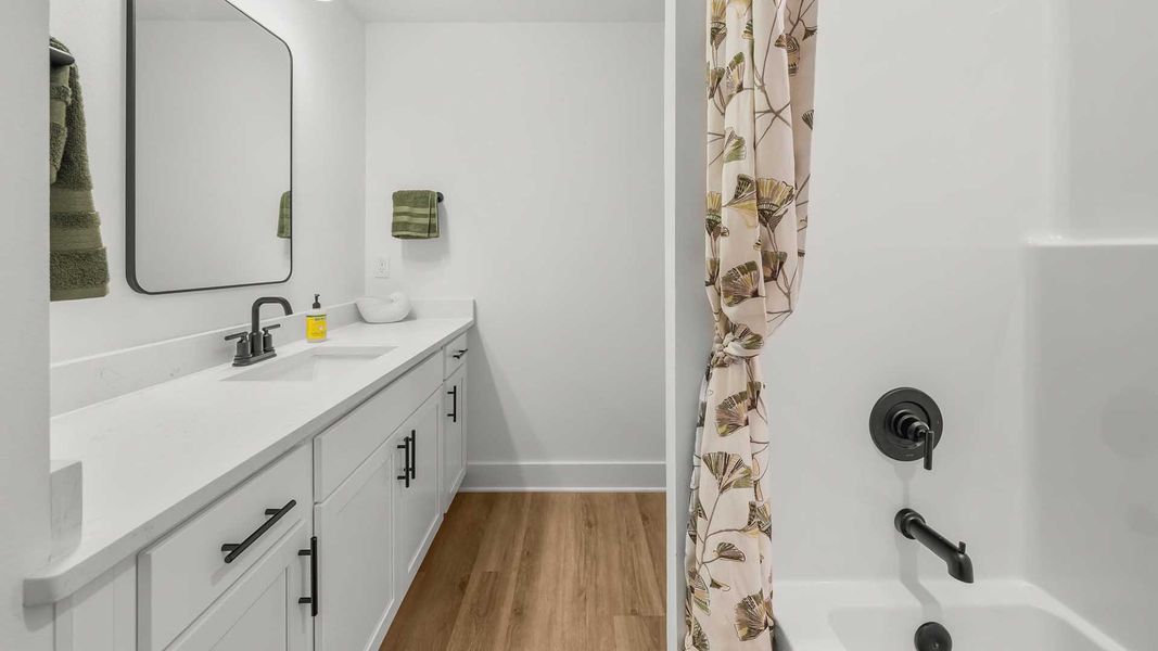 Representative furnished interior of a home built from the Alabaster by D.R. Horton in Colonial East, Panama City Beach (Image 28). Representative furnished interior of a home built from the Alabaster by D.R. Horton in Colonial East, Panama City Beach (Image 28).