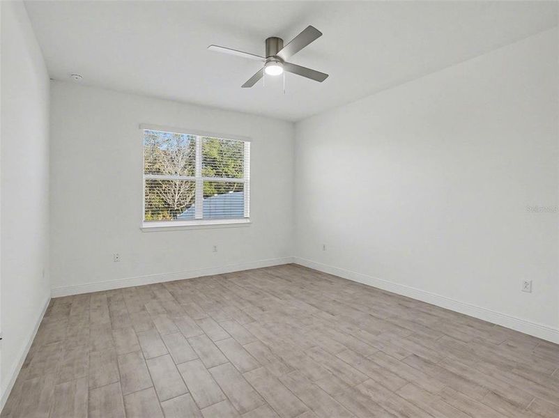 Spacious, unfurnished interior of a new home in Hills of Minneola, Minneola (Image 23). Spacious, unfurnished interior of a new home in Hills of Minneola, Minneola (Image 23).