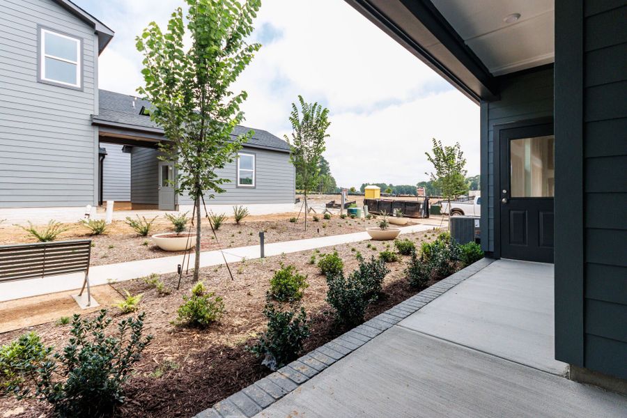 Representative exterior details of a home built from the The Whitmer by David Weekley Homes in NoVi Chatham Park - The Mews Collection, Pittsboro (Image 3). Representative exterior details of a home built from the The Whitmer by David Weekley Homes in NoVi Chatham Park - The Mews Collection, Pittsboro (Image 3).