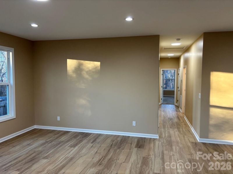 Living room leads to bedrooms/baths and flows nicely.