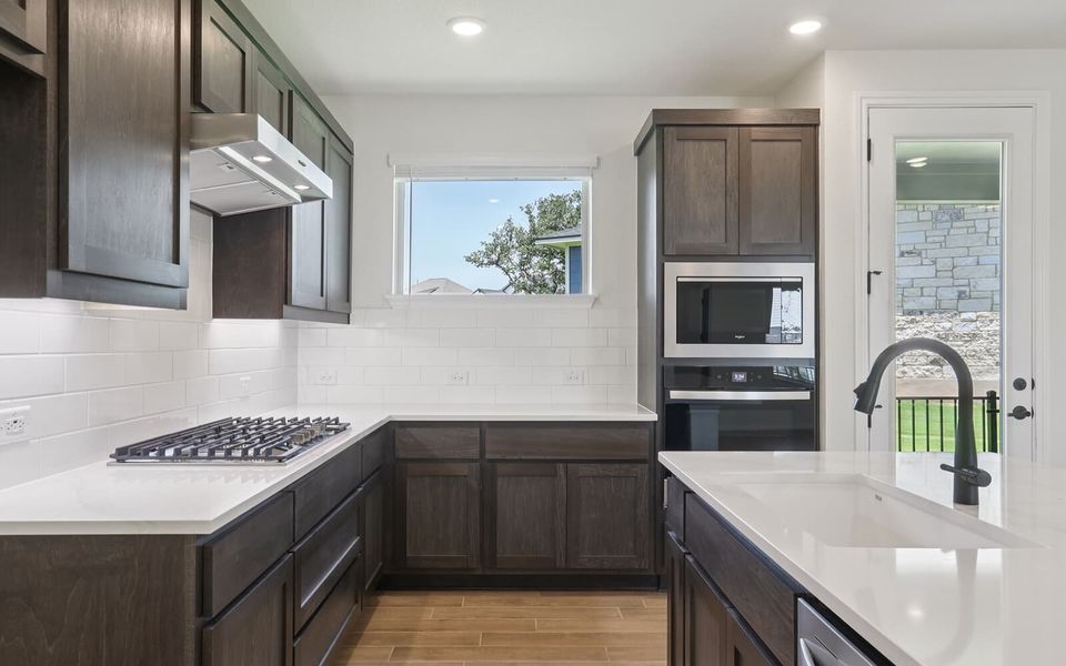 Furnished interior view inside a new home in Cottage at Kissing Tree, San Marcos (Image 7). Furnished interior view inside a new home in Cottage at Kissing Tree, San Marcos (Image 7).