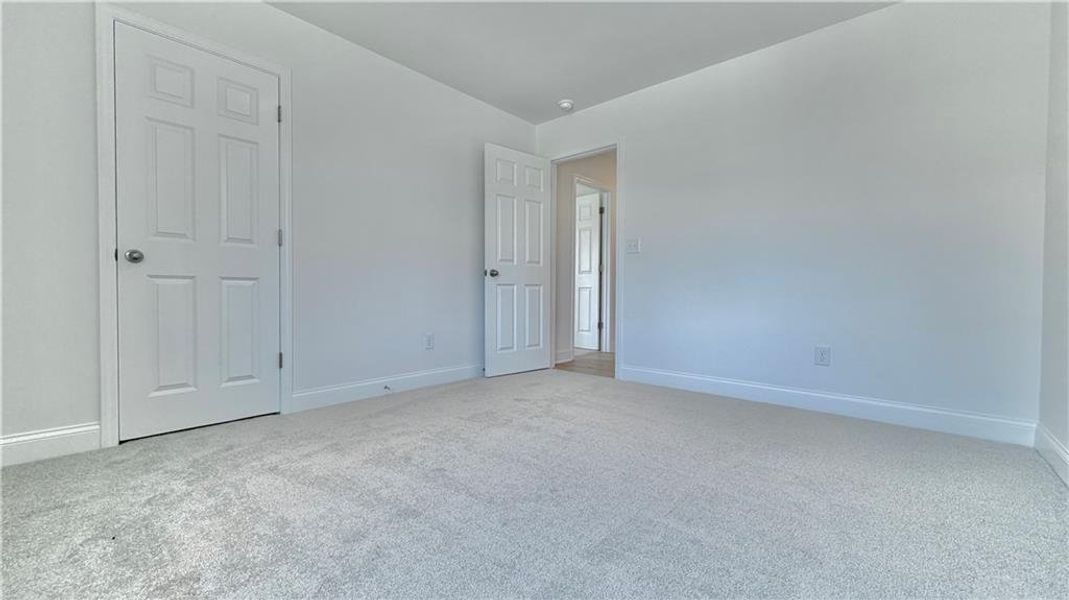 Spacious, unfurnished interior of a new home in Wehunt Meadows, Hoschton (Image 28).