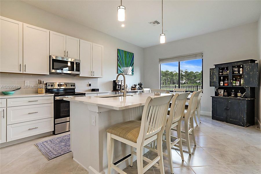 Furnished interior view inside a new home in , Palm City (Image 11).
