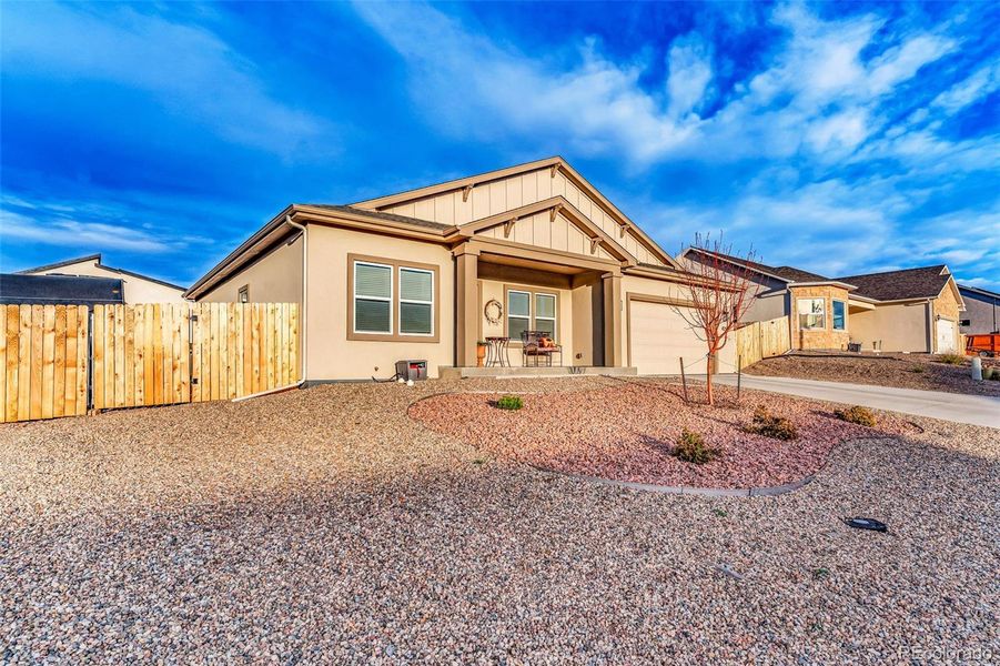 Front exterior of a new home in , Cañon City, CO, highlighting curb appeal (Image 24). Front exterior of a new home in , Cañon City, CO, highlighting curb appeal (Image 24).