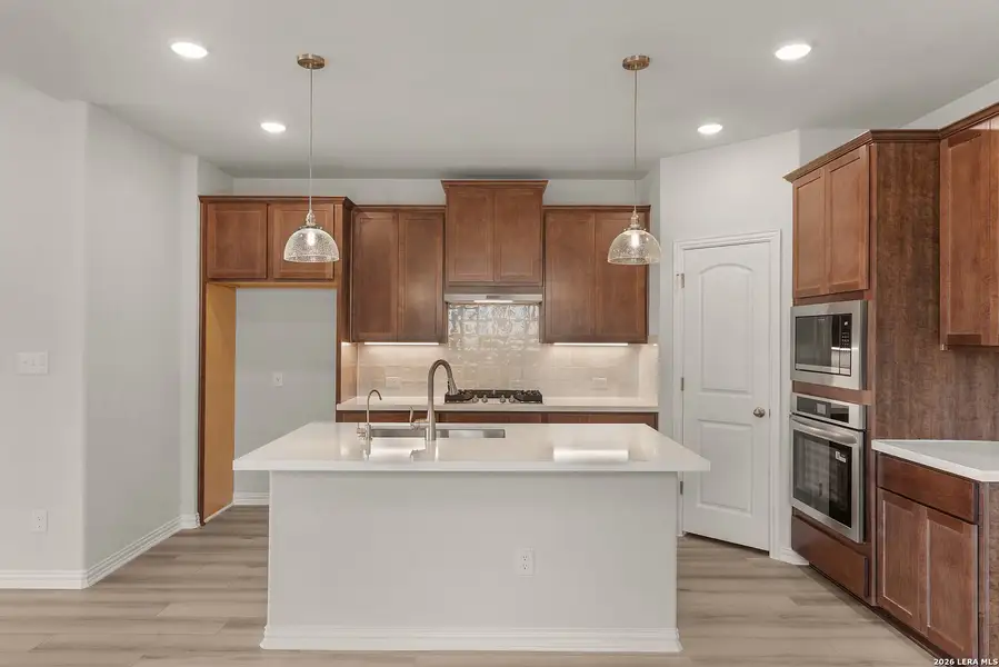 Furnished interior view inside a new home in Meyer Ranch - Enclave, New Braunfels (Image 4).