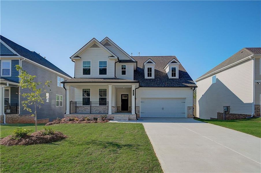 Front exterior of a new home in Cooper Park, McDonough, GA, highlighting curb appeal (Image 15).