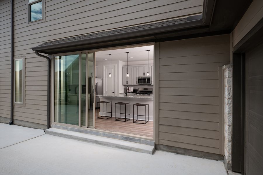 Representative exterior details of a home built from the Bergamot by Tri Pointe Homes in The Retreat at Harvest, Argyle (Image 3).