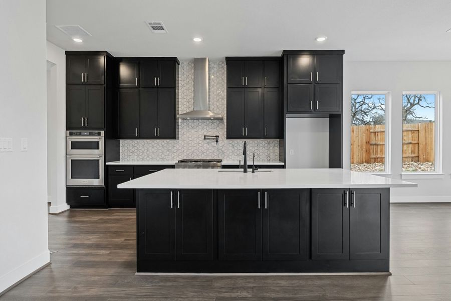 Furnished interior view inside a new home in Caliterra, Dripping Springs (Image 7).