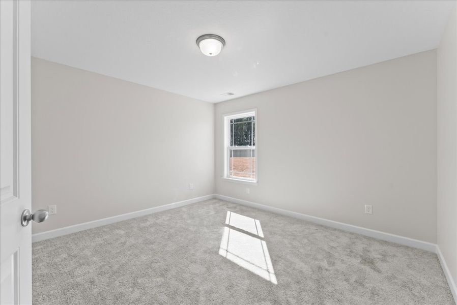 Representative unfurnished interior of a home built from the Addington by Enchanted Homes in Ballentine Ridge, Lyman (Image 39).
