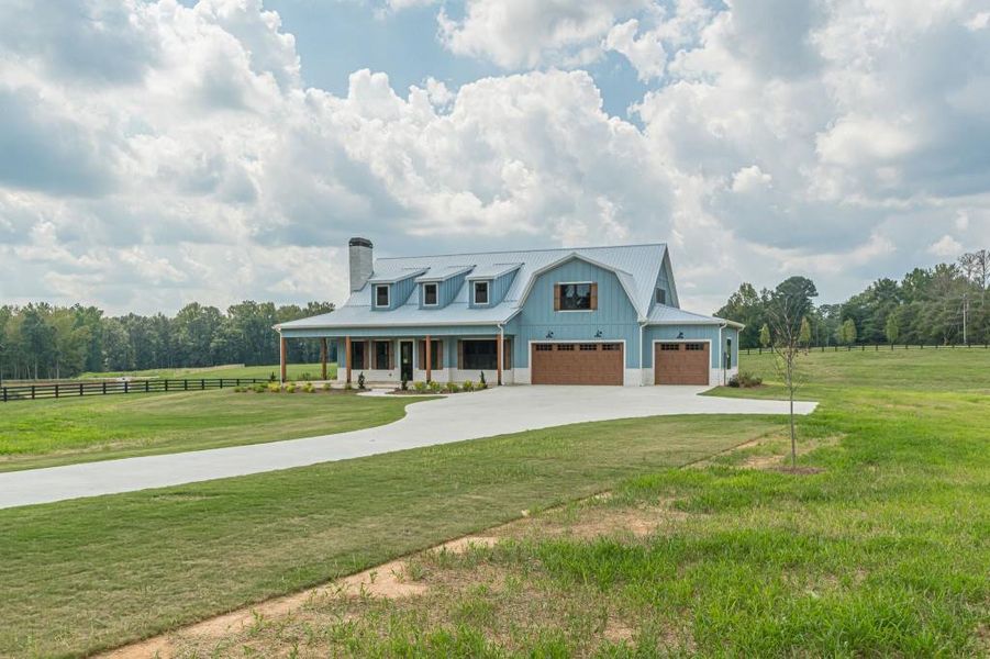 Front exterior of a new home in , Bremen, GA, highlighting curb appeal (Image 28).