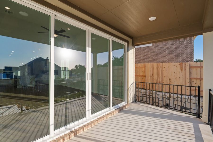 Exterior details and patio area of a home in Terrace Collection at Lariat, Liberty Hill (Image 26).