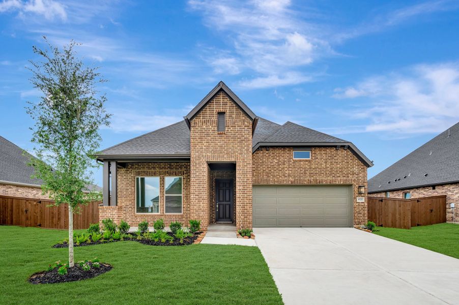 Front exterior of a new home in Beacon Point at Lago Mar - Retreat Collection, Texas City, TX, highlighting curb appeal (Image 2). Front exterior of a new home in Beacon Point at Lago Mar - Retreat Collection, Texas City, TX, highlighting curb appeal (Image 2).