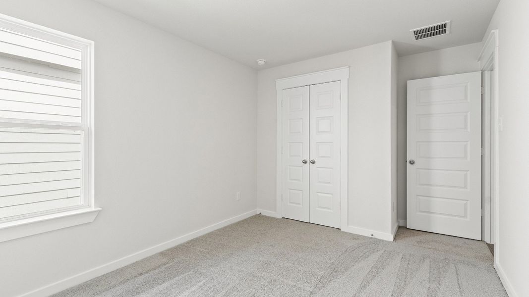 Representative furnished interior of a home built from the Avalon by Brightland Homes in Mostyn Springs, Magnolia (Image 15).