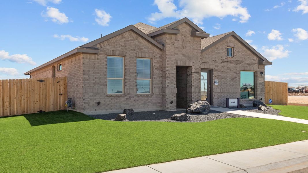 Front exterior of a new home in Mustang Ridge, Andrews, TX, highlighting curb appeal (Image 2).