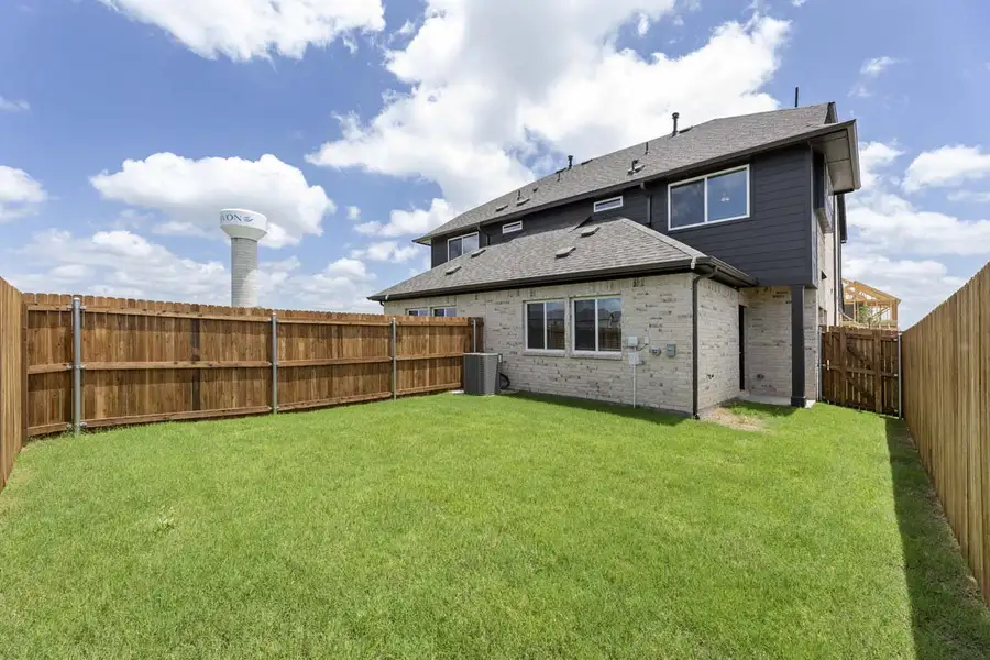 Exterior details and patio area of a home in Elevon, Lavon (Image 3).