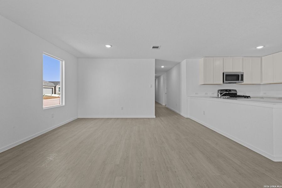 Spacious, unfurnished interior of a new home in Voss Farms: Watermill Collection, New Braunfels (Image 12).