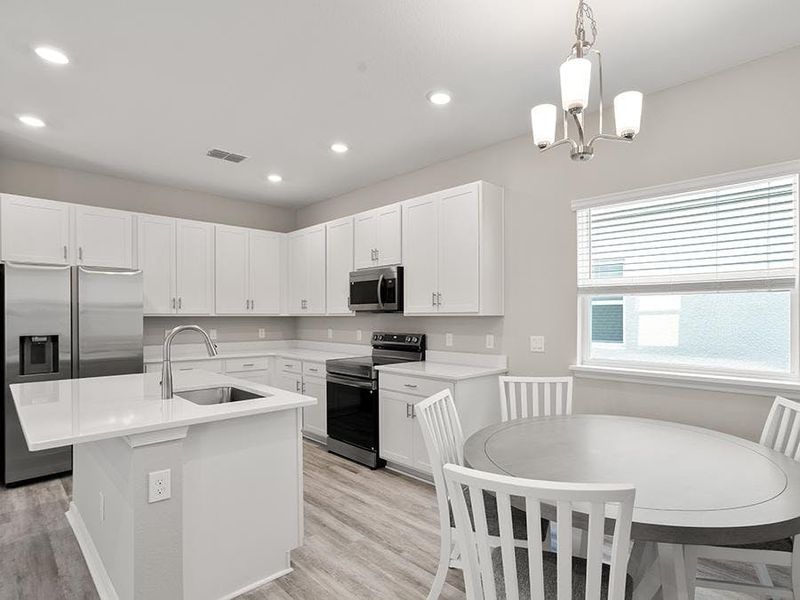 Meals are a delight, with a sunny dining cafe - Donatella bungalow by Highland Homes