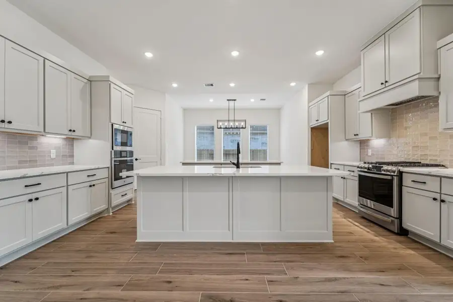 Furnished interior view inside a new home in Evergreen, Conroe (Image 12). Furnished interior view inside a new home in Evergreen, Conroe (Image 12).