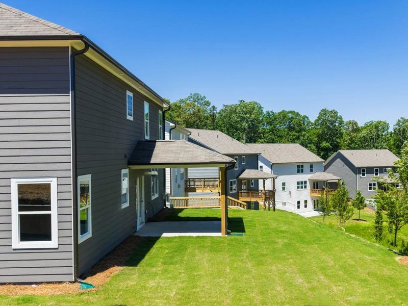 Front exterior of a new home in Falcon Landing, Gainesville, GA, highlighting curb appeal (Image 19).