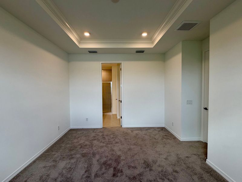 Representative unfurnished interior of a home built from the Juno by William Ryan Homes in The Sanctuary – Resort Collection, Punta Gorda (Image 25).
