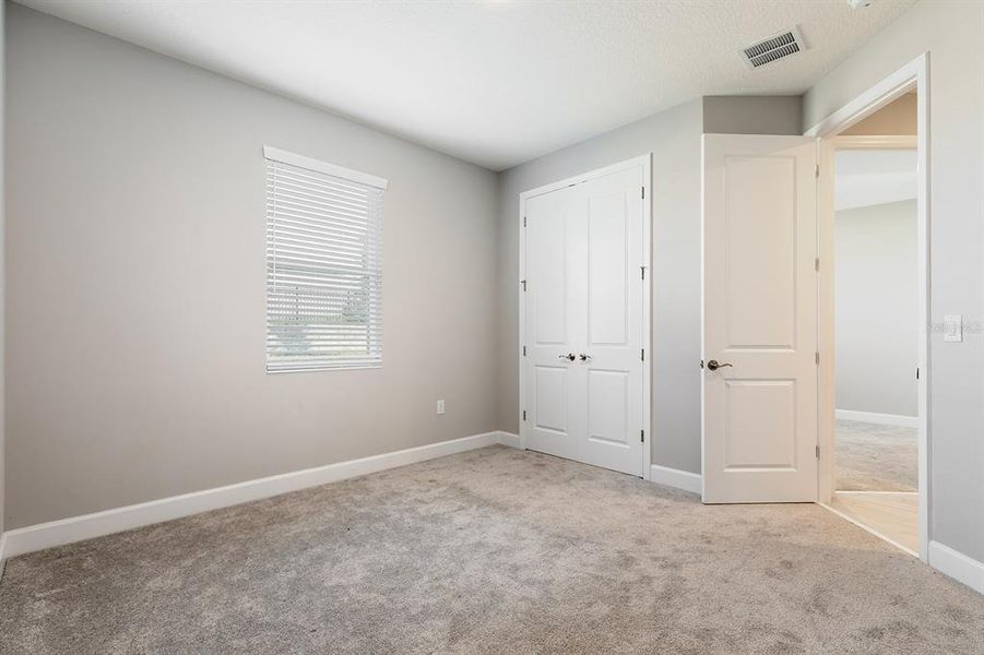 Spacious, unfurnished interior of a new home in Wolf Lake Ranch, Apopka (Image 23).