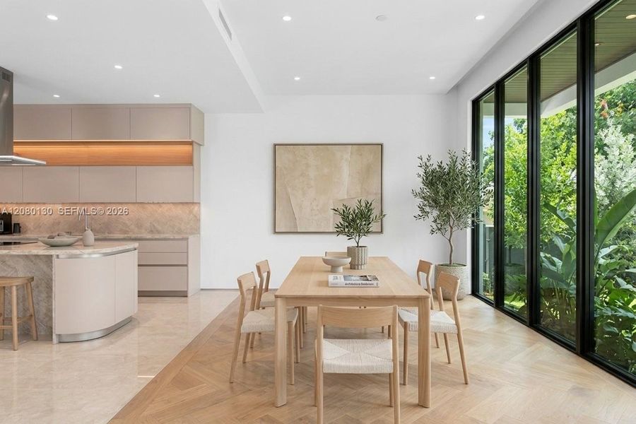 Dining Room. Disclaimer: Several photographs presented in this listing contain digitally added furniture, artwork, and decor. These virtually staged images are intended solely for illustrative purposes.