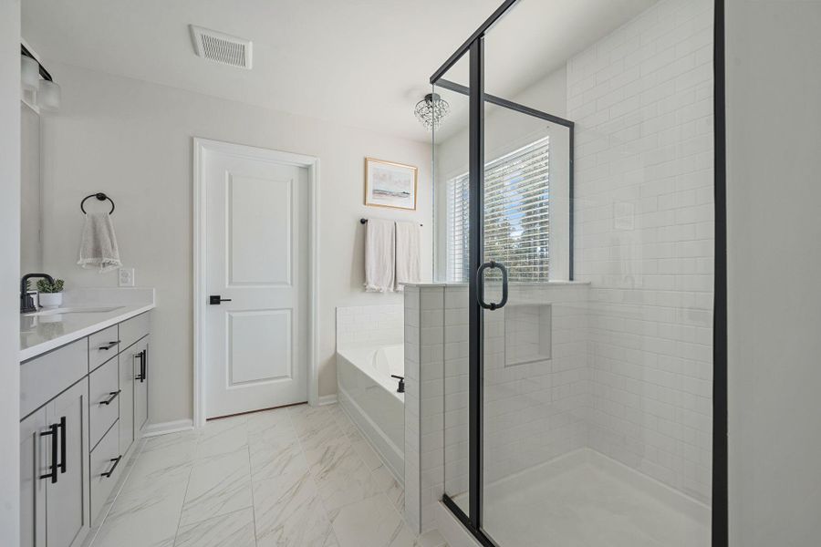 Furnished interior view inside a new home in Jasmine Point at Lakes of Cane Bay, Summerville (Image 35).