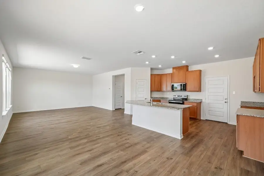 Furnished interior view inside a new home in Preserve at Culebra - Sterling Collection, San Antonio (Image 8).