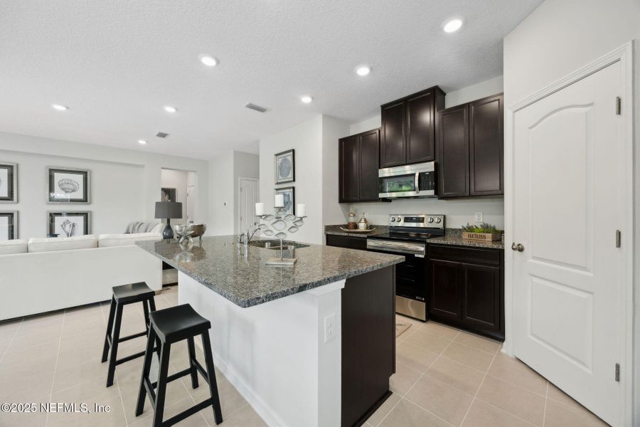 Furnished interior view inside a new home in , Jacksonville (Image 9). Furnished interior view inside a new home in , Jacksonville (Image 9).
