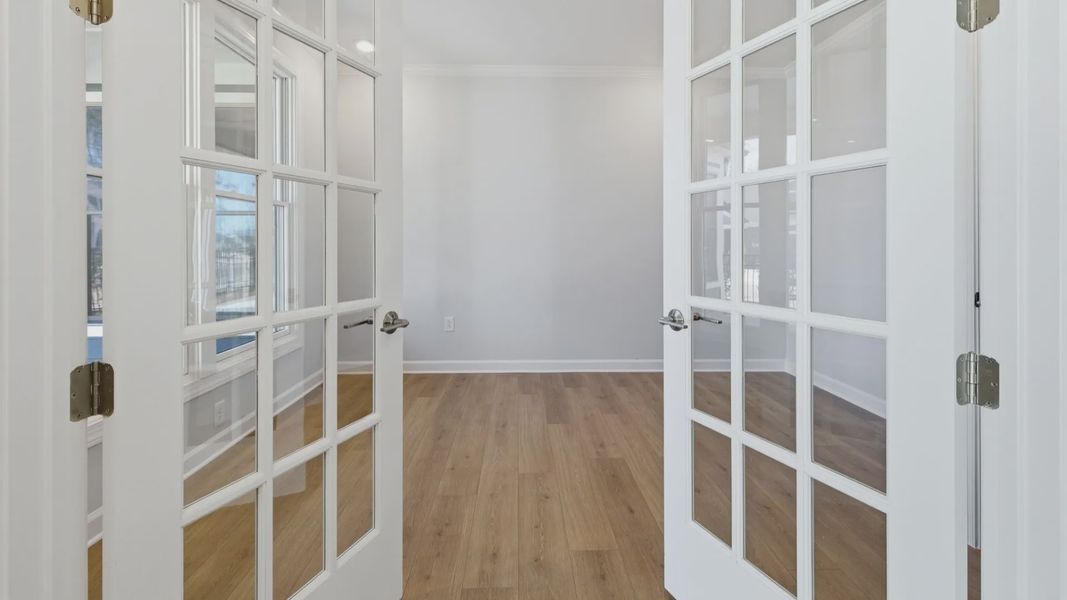 Spacious, unfurnished interior of a new home in The Courtyards at Oak Grove, Durham (Image 13).