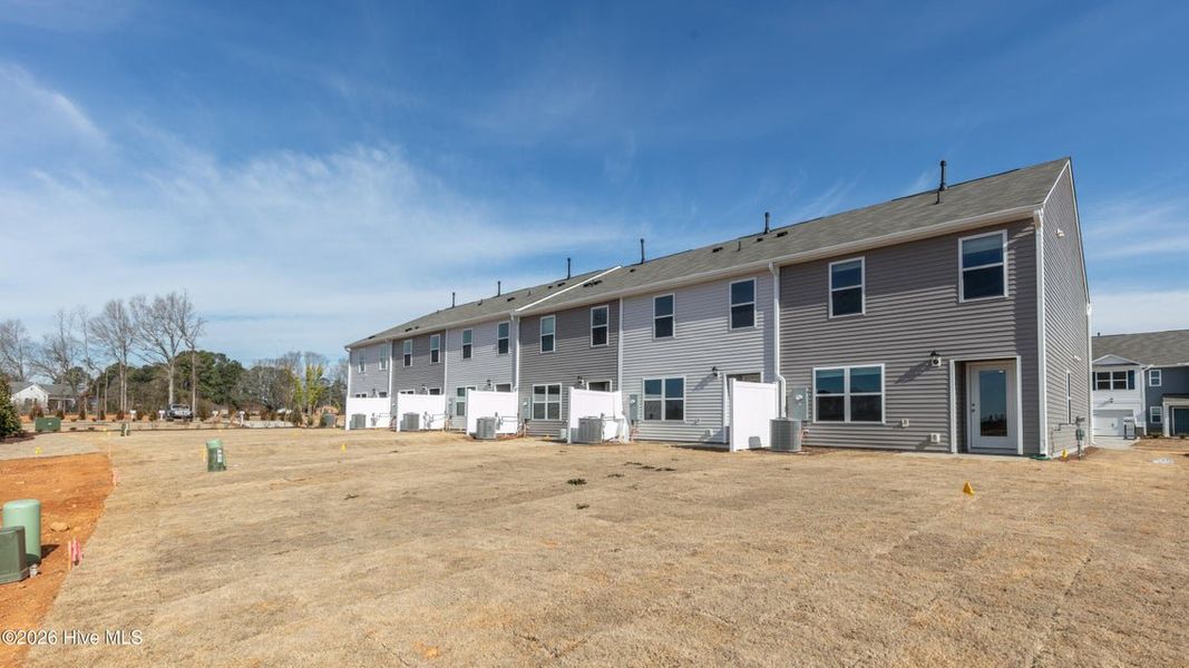 Exterior details and patio area of a home in The Townes at Ridgewood Farms, Winterville (Image 4).