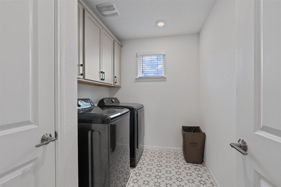 Laundry room with shelving