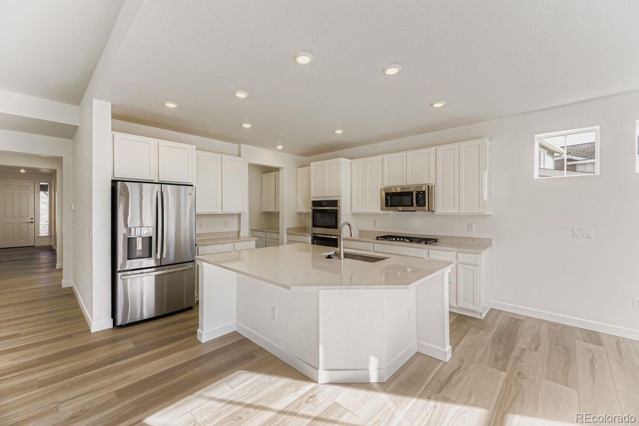 Furnished interior view inside a new home in Macanta: The Grand Collection, Castle Rock (Image 6). Furnished interior view inside a new home in Macanta: The Grand Collection, Castle Rock (Image 6).