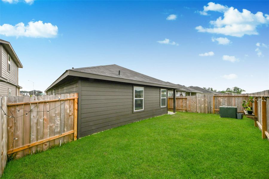 Exterior details and patio area of a home in , Houston (Image 22).