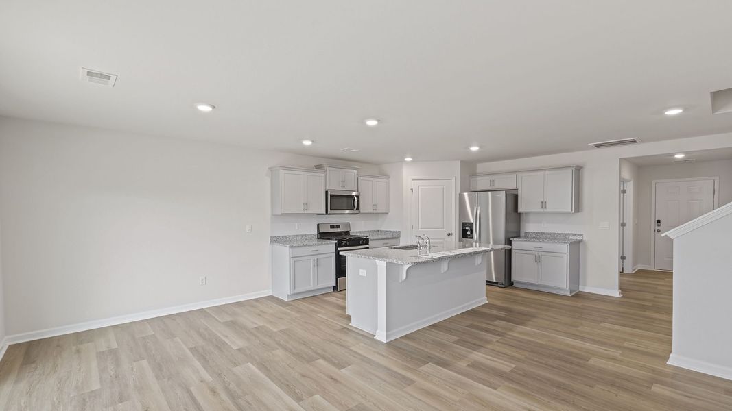 Furnished interior view inside a new home in Bentley Park, Greenwood (Image 8). Furnished interior view inside a new home in Bentley Park, Greenwood (Image 8).
