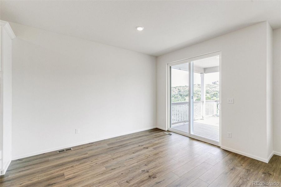 Spacious, unfurnished interior of a new home in Terrain Oak Valley, Castle Rock (Image 19).