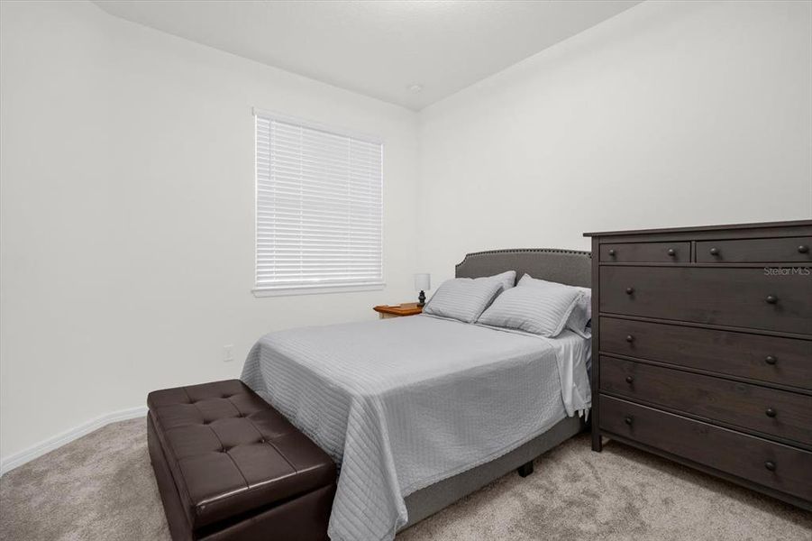 Furnished interior view inside a new home in Tohoqua Reserve, Kissimmee (Image 17).