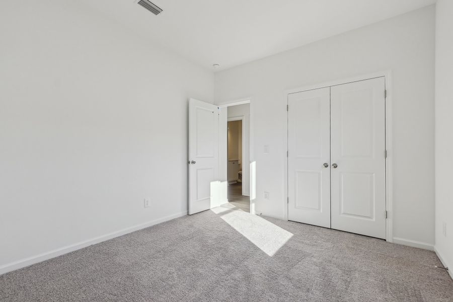 Representative unfurnished interior of a home built from the Timber by Ashton Woods in Middleton Farms, Middlesex (Image 17).