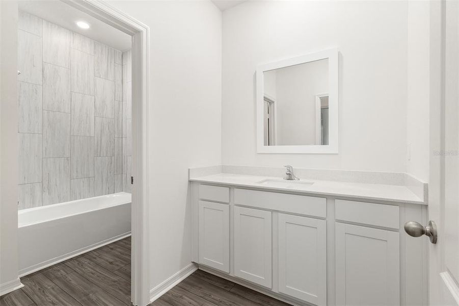 Furnished interior view inside a new home in Peach Crossings, Winter Haven (Image 9).