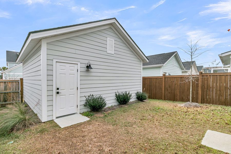 Exterior details and patio area of a home in Nexton - Midtown - The Park Collection, Summerville (Image 30).